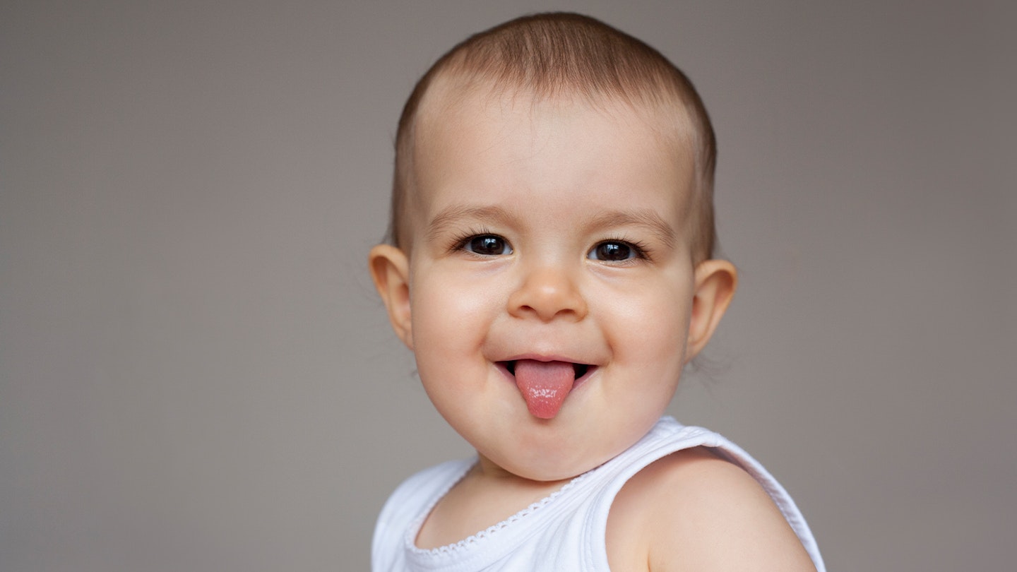 baby sticking tongue out